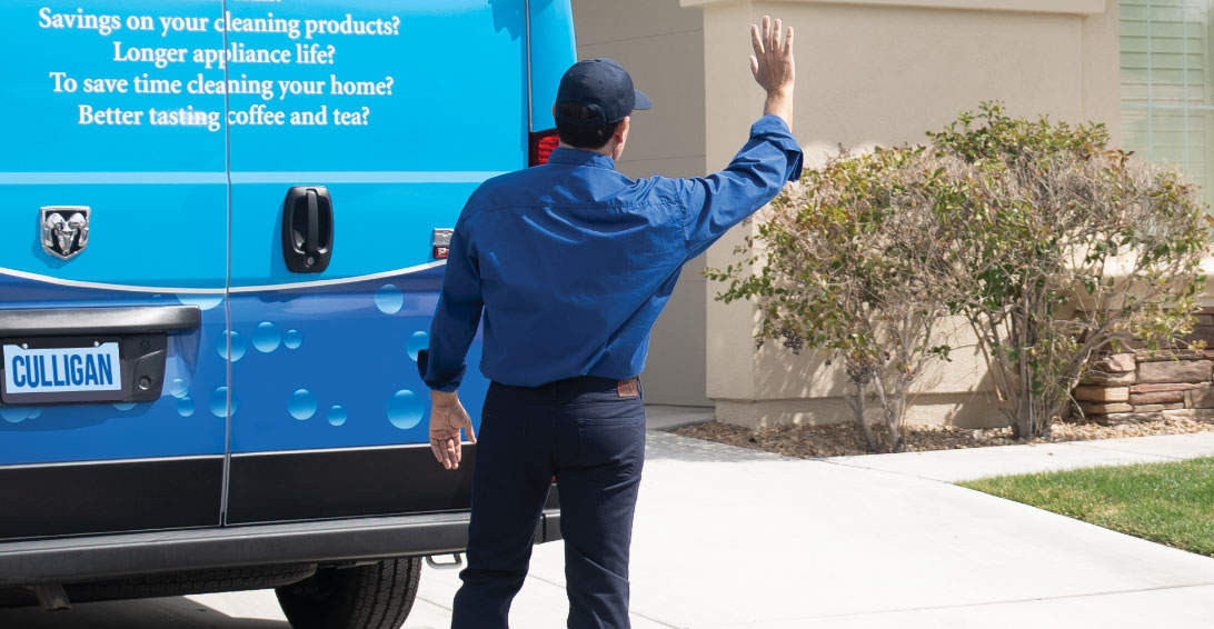 Culligan Man waving from his van